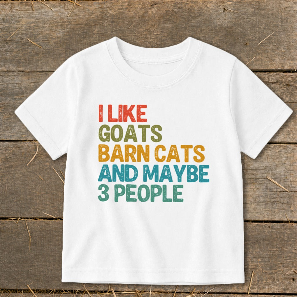 White t-shirt with "I LIKE GOATS BARN CATS AND MAYBE 3 PEOPLE" text.