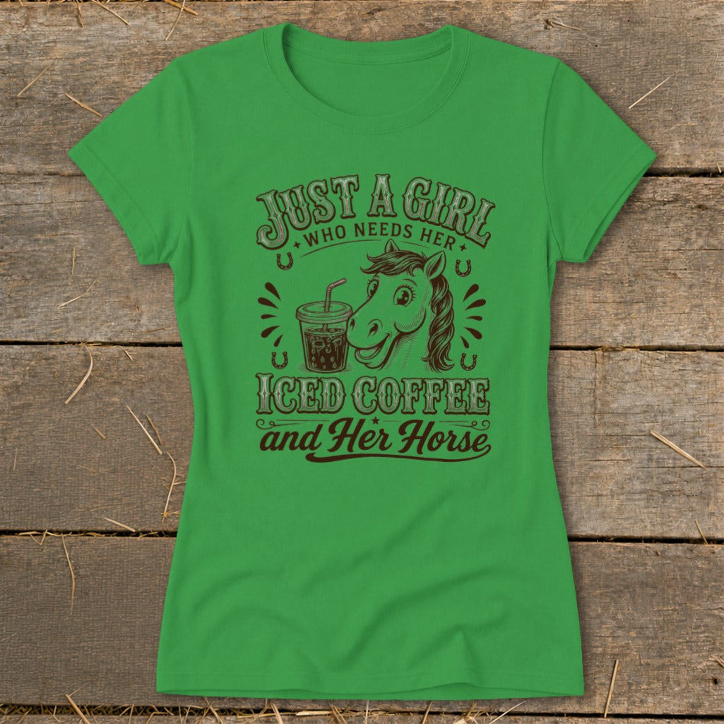 Green short-sleeved t-shirt with brown graphic featuring a horse, iced coffee, and the text Just a girl who needs her iced coffee and her horse.