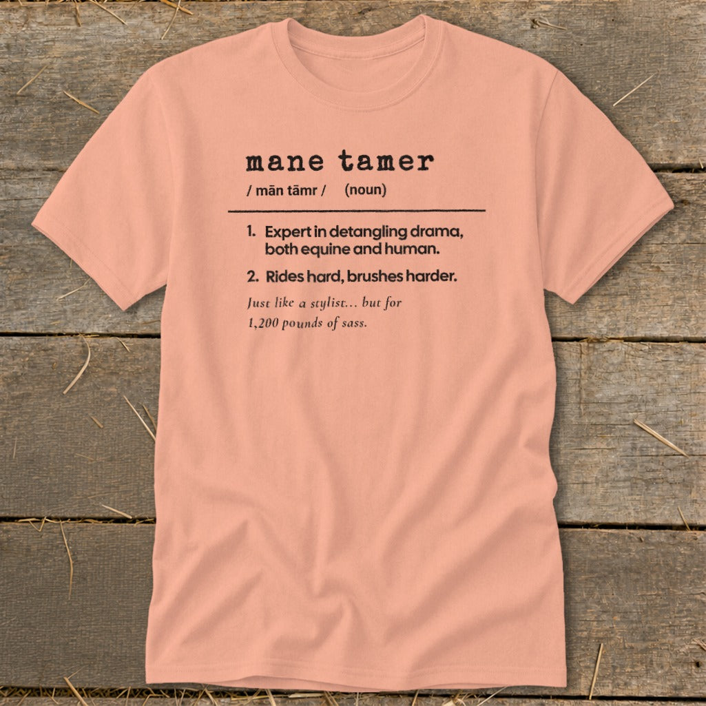 Peach t-shirt with "mane tamer" definition about equine and human drama.