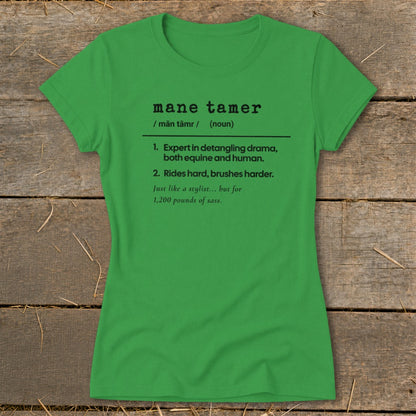 Green t-shirt with black text defining "mane tamer" for horse owners.