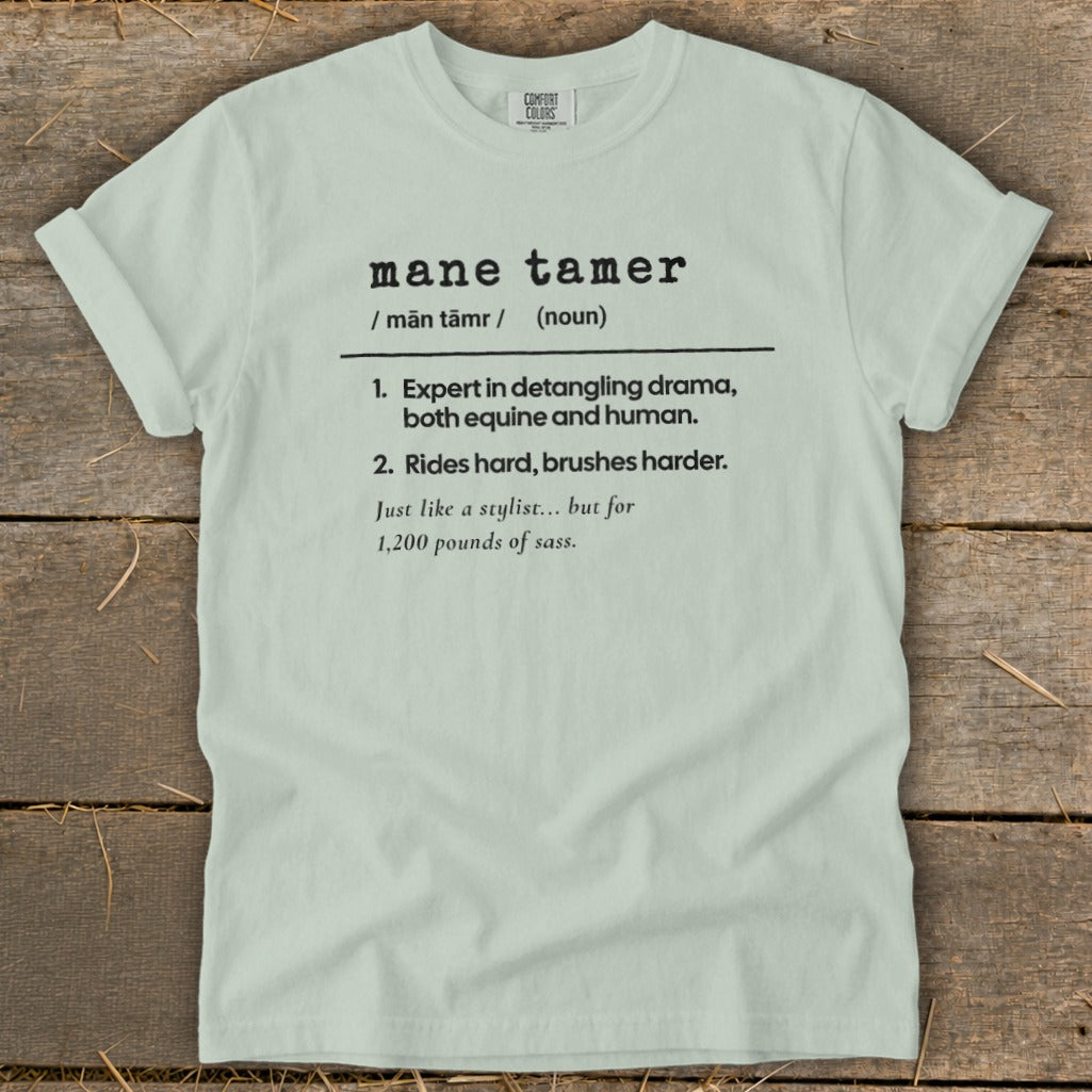 Light green t-shirt with "mane tamer" definition including equine and human drama.