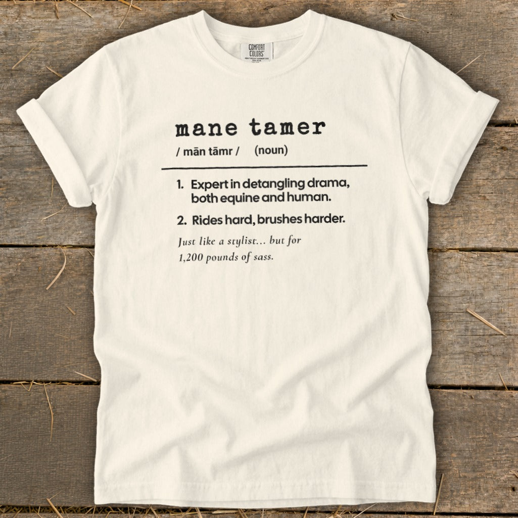 White t-shirt with "mane tamer" definition: expert in detangling drama, rides hard.
