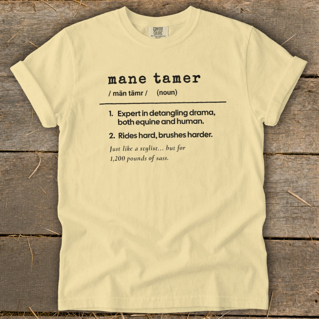 Light yellow t-shirt with "mane tamer" definition including equine and human drama.