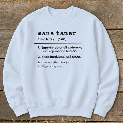 White sweatshirt with "Mane Tamer" definition featuring equine humor.