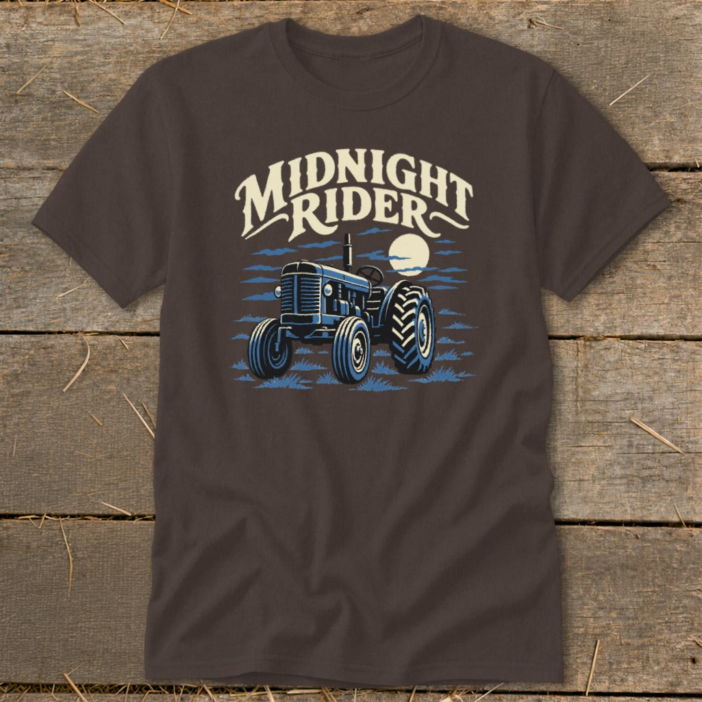 Dark brown t-shirt featuring a blue tractor graphic and the text Midnight Rider.