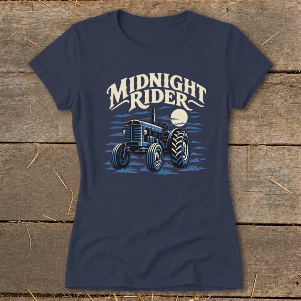 Navy blue t-shirt featuring a graphic of a tractor under a full moon and text reading MIDNIGHT RIDER.