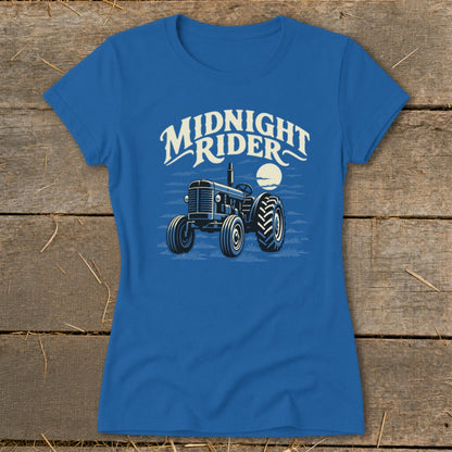 Blue short-sleeved t-shirt featuring a vintage tractor graphic and the text Midnight Rider.