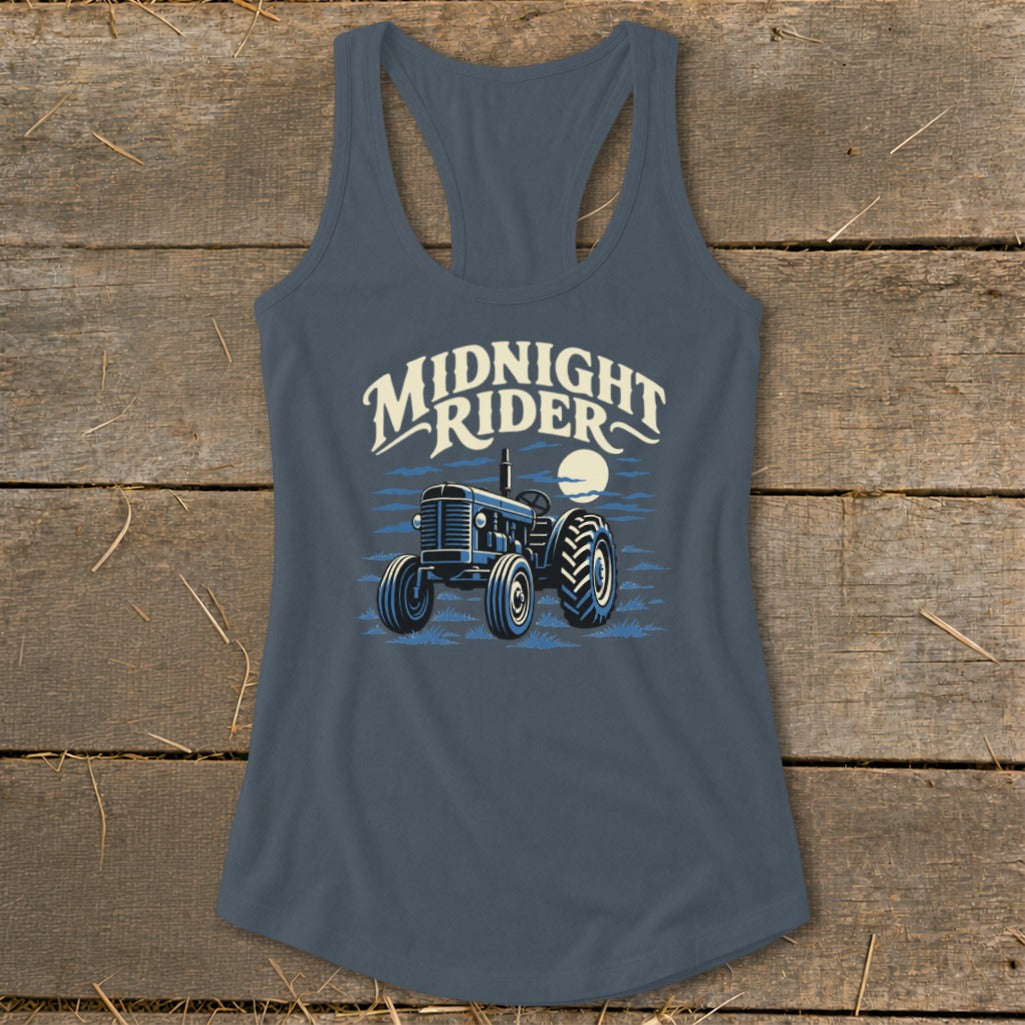 A dark gray racerback tank top featuring a graphic of a blue tractor with text reading MIDNIGHT RIDER.