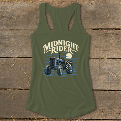 An olive green racerback tank top featuring a graphic of a blue tractor with text that reads Midnight Rider.