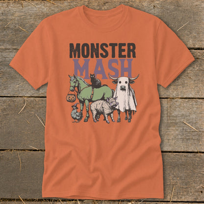 Orange t-shirt with "MONSTER MASH" and Halloween animals: horse, cat, chicken, pig, bull ghost.