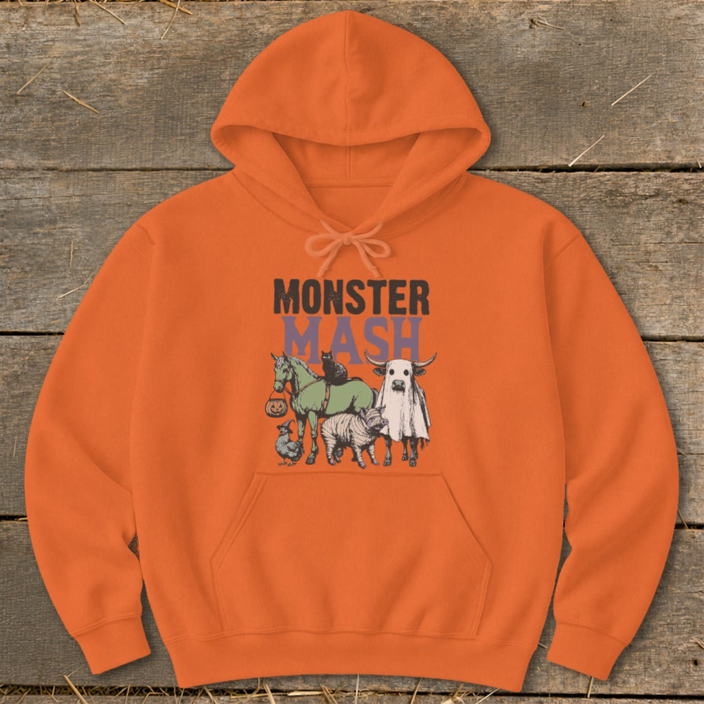 Orange hoodie with "Monster Mash" text and cartoon animals in Halloween costumes.