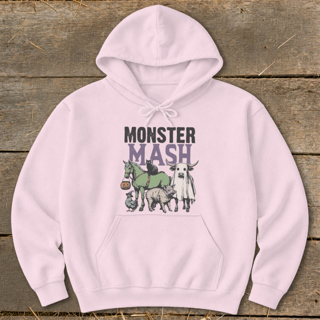 Pink hoodie with "MONSTER MASH" text and cartoon farm animals in Halloween costumes.