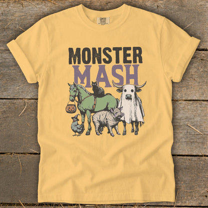 Yellow t-shirt with "Monster Mash" text and cartoon animals for Halloween.
