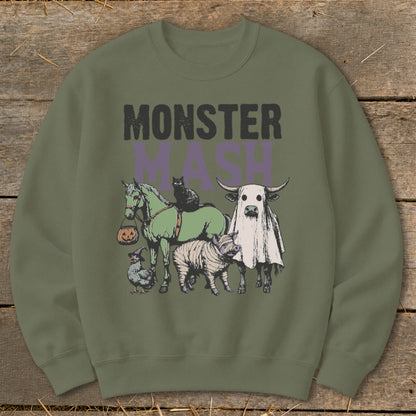 Green sweatshirt with "MONSTER MASH" text and Halloween-themed animals.