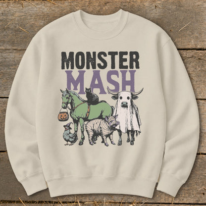 Crewneck sweatshirt with "Monster Mash" text and Halloween-themed animal illustrations.