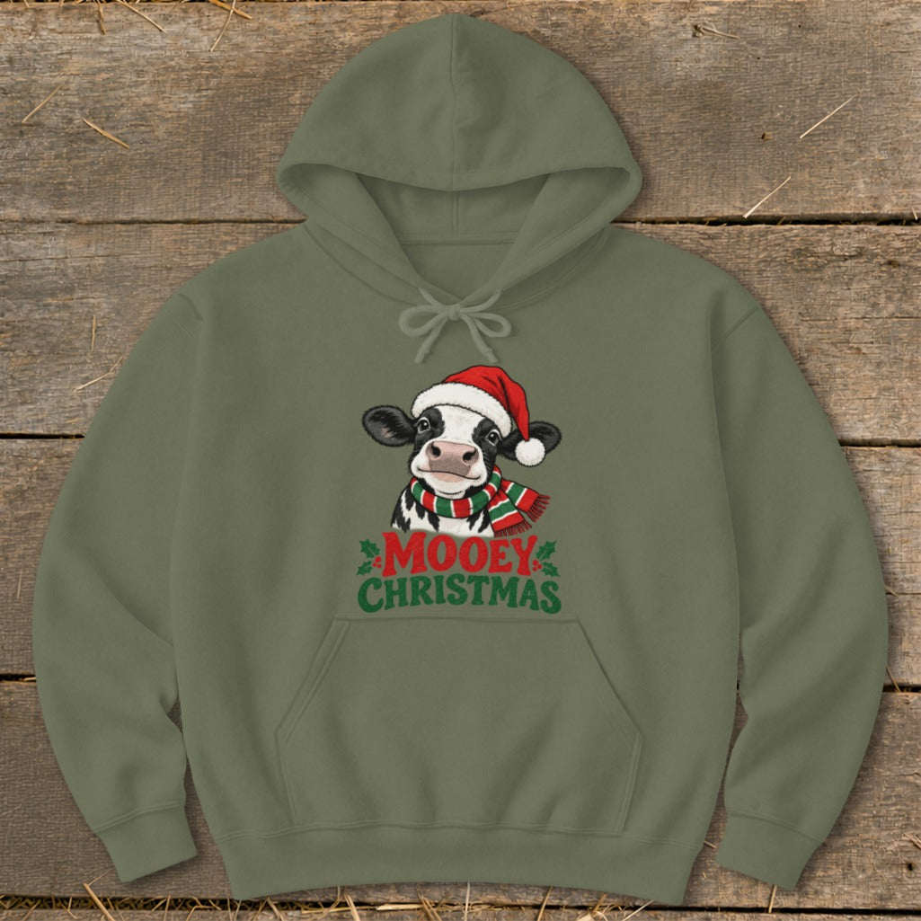 Green hoodie with a cow wearing a Santa hat and scarf, text reads "MOOEY CHRISTMAS".