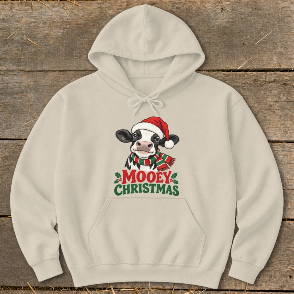 Cream hoodie with a cartoon cow wearing a Santa hat and scarf, saying "Mooey Christmas."