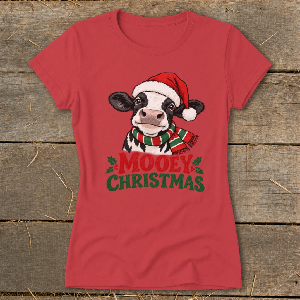 Red t-shirt with a cow wearing a Santa hat and scarf, text MOOEY CHRISTMAS.