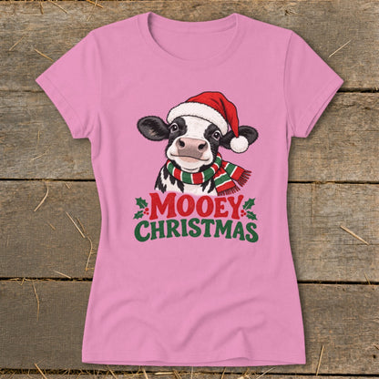 Pink t-shirt with a cow wearing a Santa hat and scarf, with "Mooey Christmas" text.