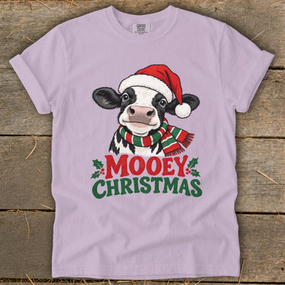 Cow wearing Santa hat and scarf with "Mooey Christmas" text.