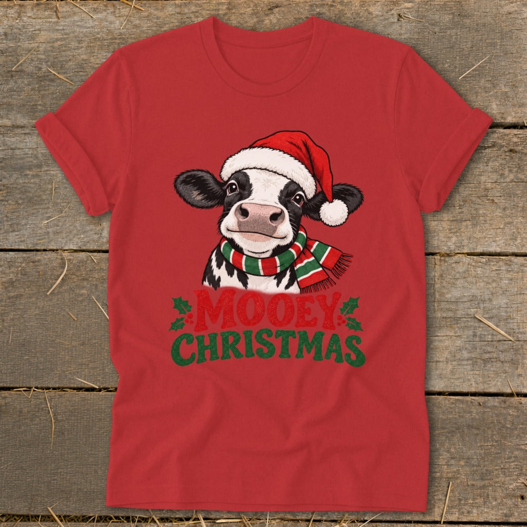 Red t-shirt with a festive cow wearing a Santa hat and scarf, text "MOOEY CHRISTMAS".