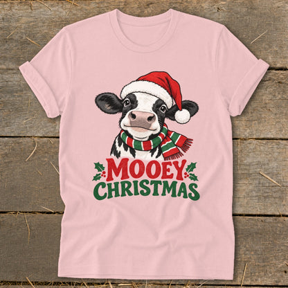 Pink t-shirt with a cow wearing a Santa hat and scarf, text reads "Mooey Christmas".