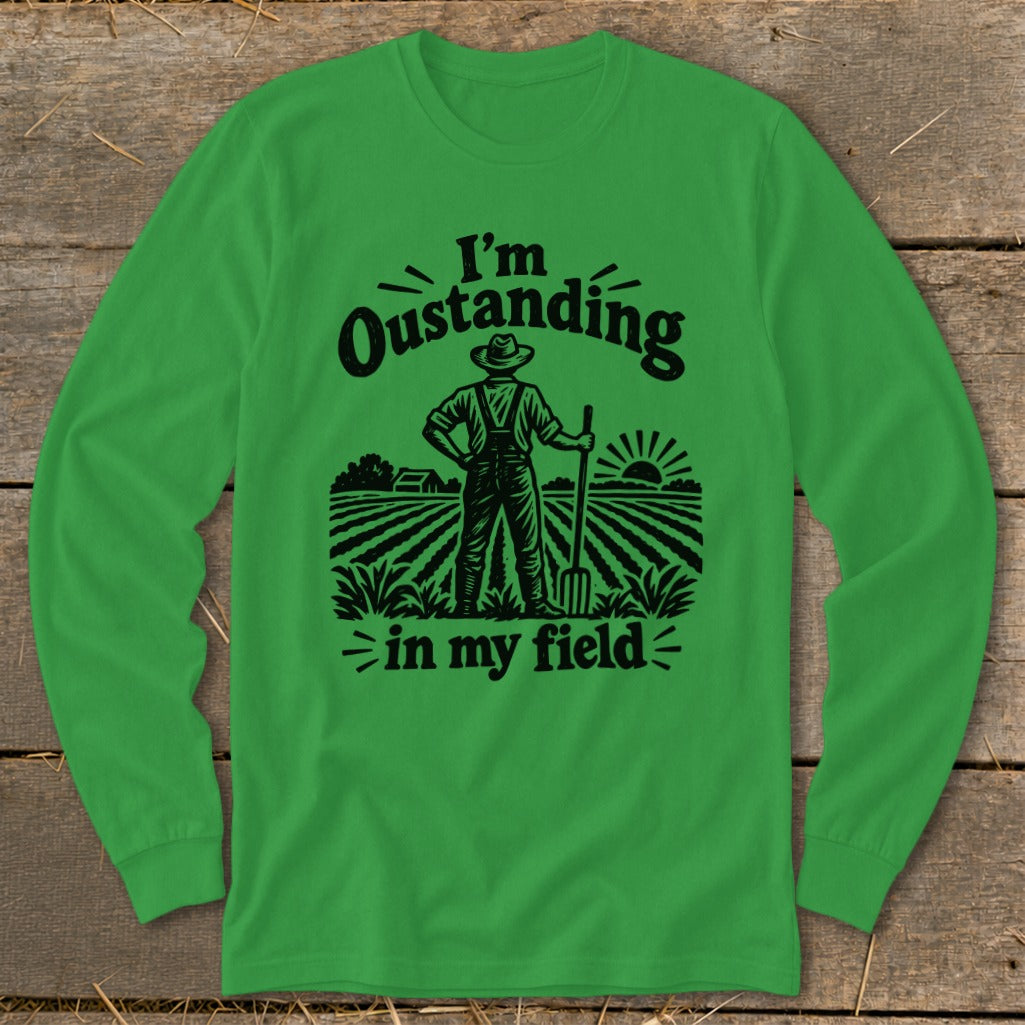 Green long-sleeve shirt with "I'm Oustanding in my field" text and farmer illustration.