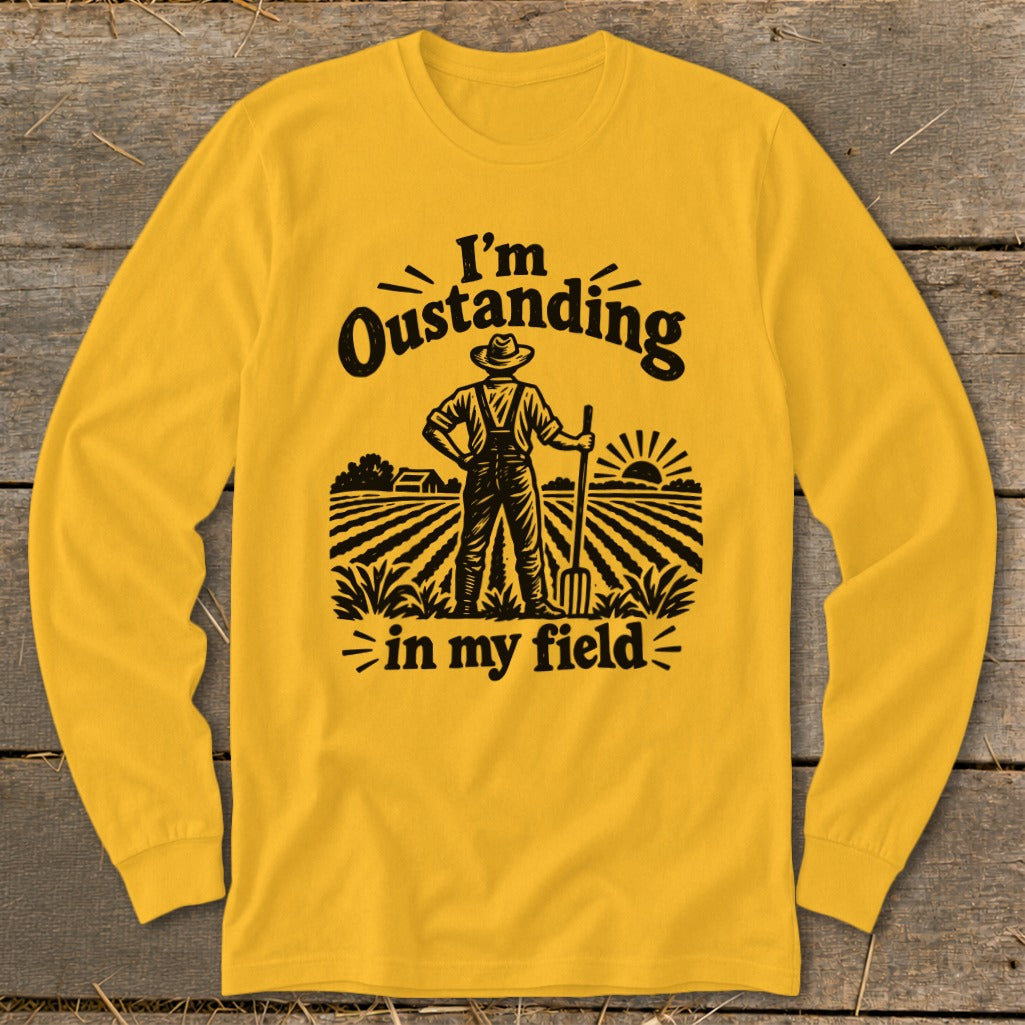 Yellow long-sleeve shirt with "I'm Oustanding in my field" farmer graphic.
