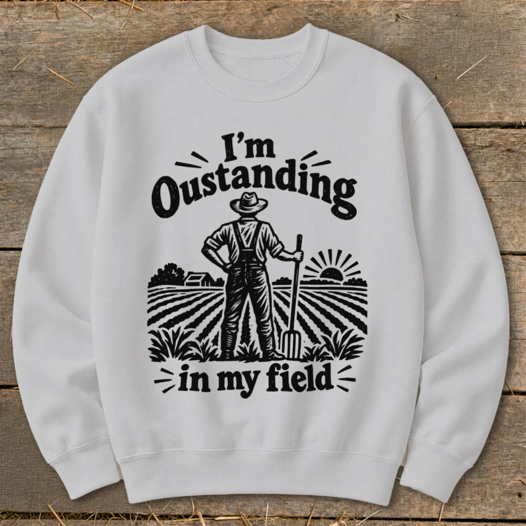 Sweatshirt with "I'm Outstanding in my Field" text and farmer graphic.