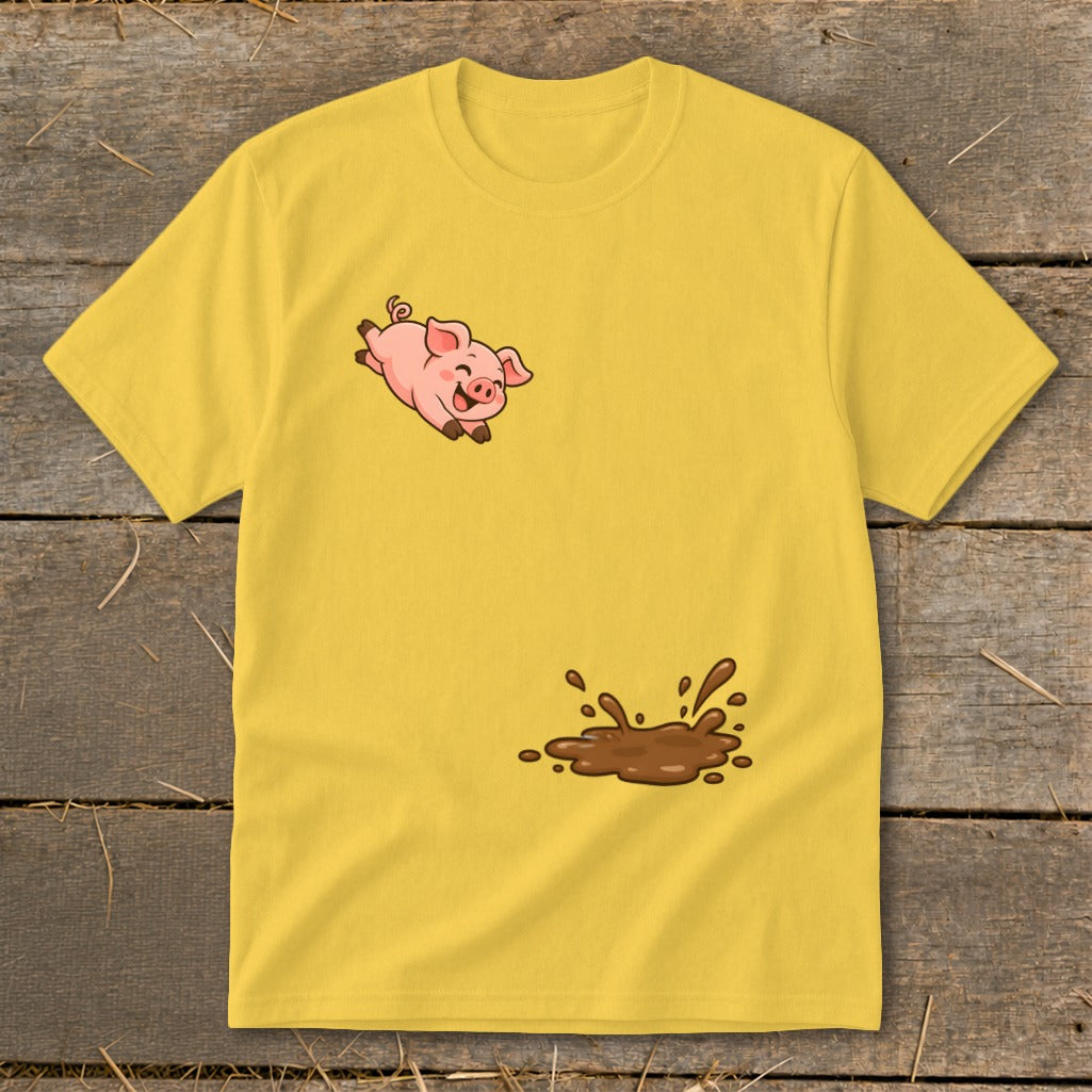 Yellow t-shirt with a cartoon pig jumping into a mud puddle graphic.