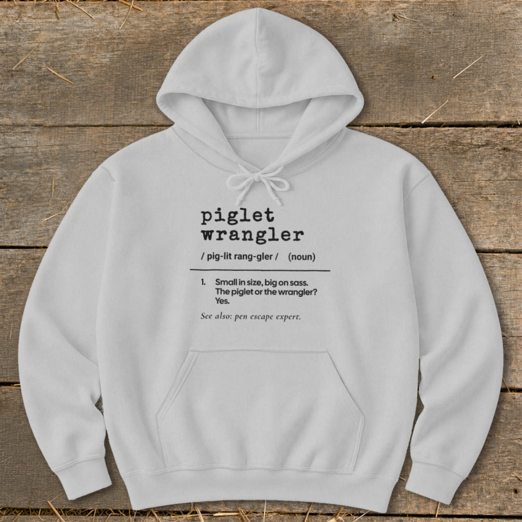 White hoodie with "piglet wrangler" definition printed on front.