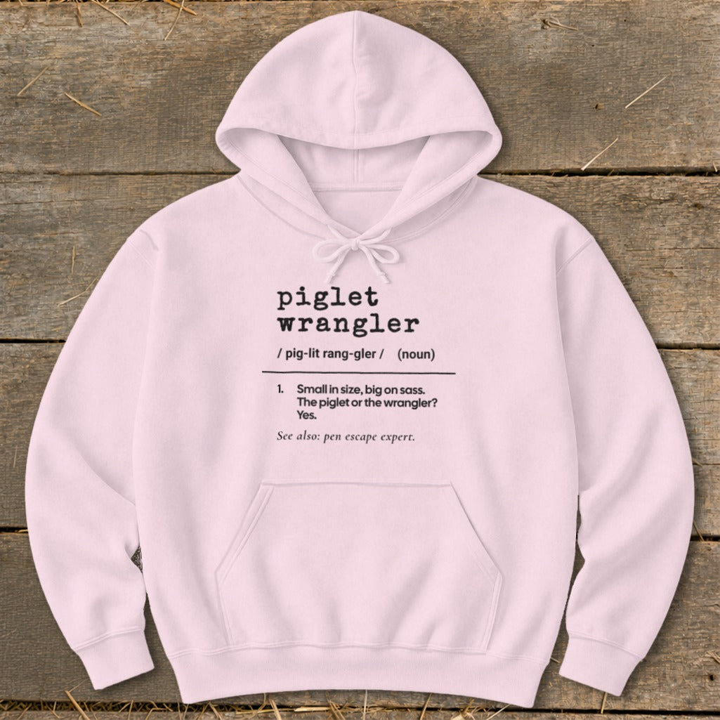 Pink hoodie with "piglet wrangler" definition.