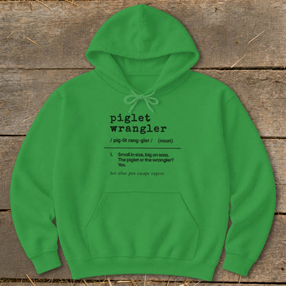 Green hoodie with "piglet wrangler" definition including pronunciation and humorous meaning.