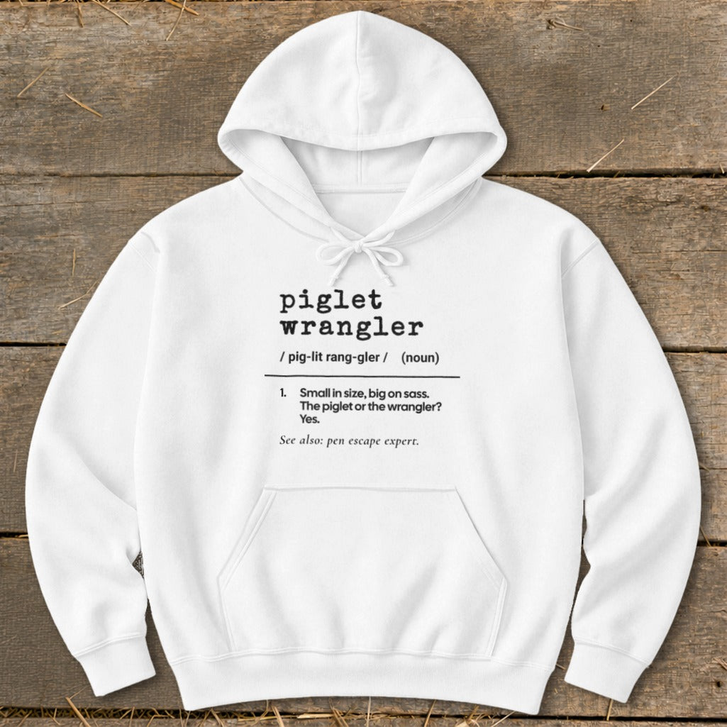 White hoodie with black text defining "piglet wrangler."