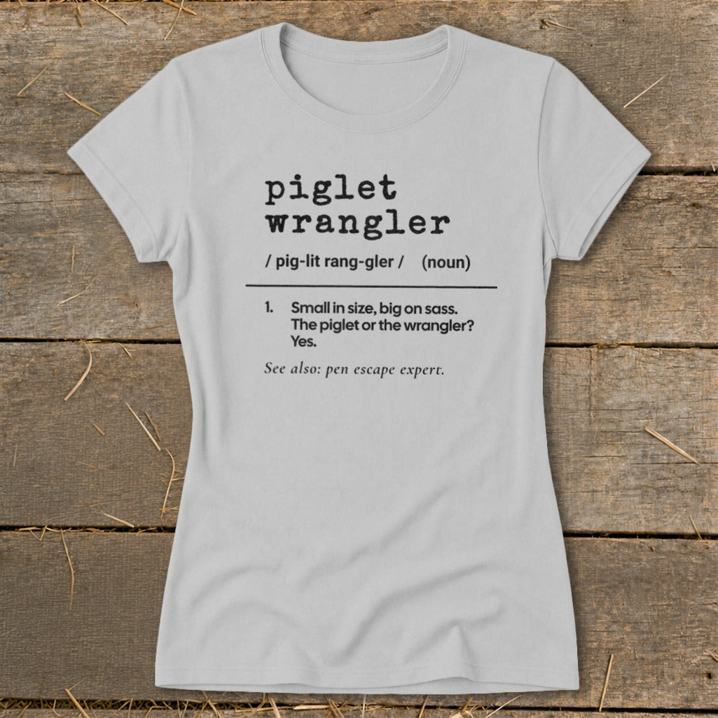 Light gray t-shirt with "piglet wrangler" definition printed on it.