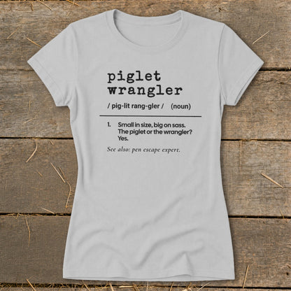 Light gray t-shirt with "piglet wrangler" definition printed on it.