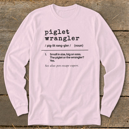 Pink long-sleeve shirt with "piglet wrangler" definition.