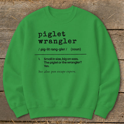Green sweatshirt with "piglet wrangler" definition printed on it.