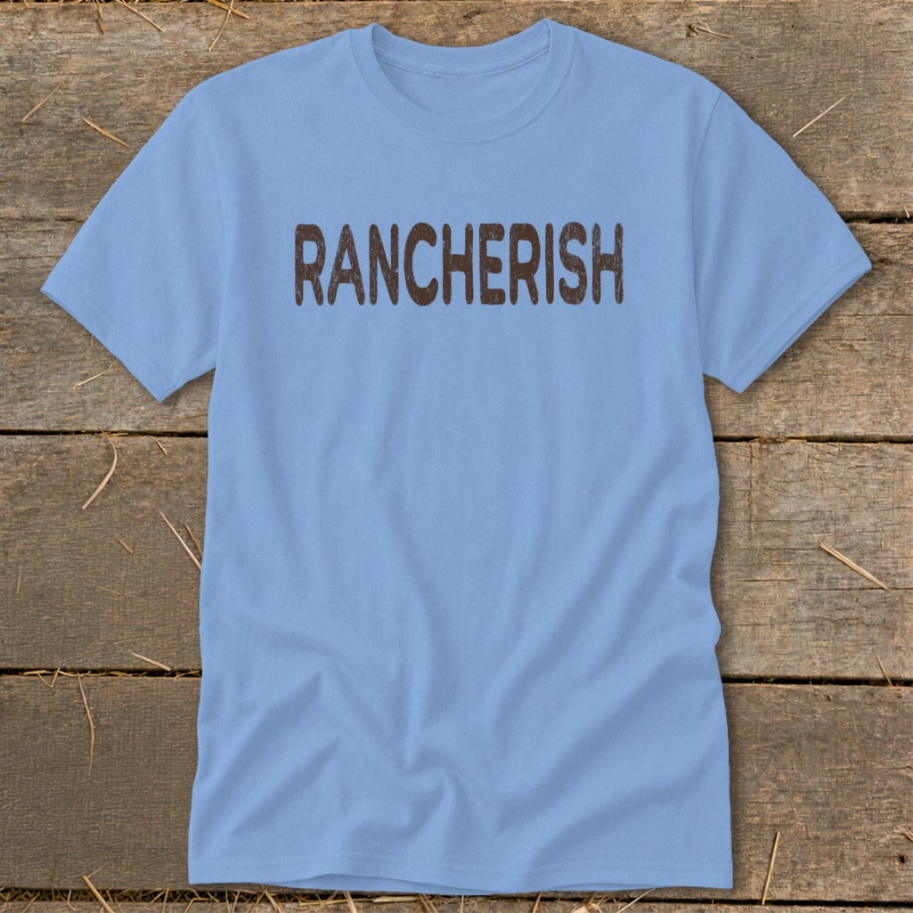 Light blue t-shirt with the word "RANCHERISH" printed in distressed brown text.