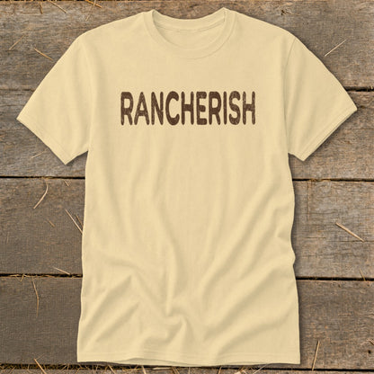 Pale yellow t-shirt with brown distressed text reading "RANCHERISH".