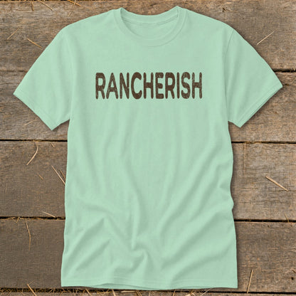 Light green t-shirt with distressed brown "RANCHERISH" text across chest.