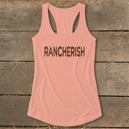 Peach racerback tank top with "RANCHERISH" printed in distressed brown letters.