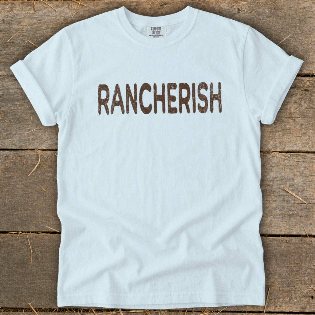 Light blue t-shirt with brown text reading "RANCHERISH"