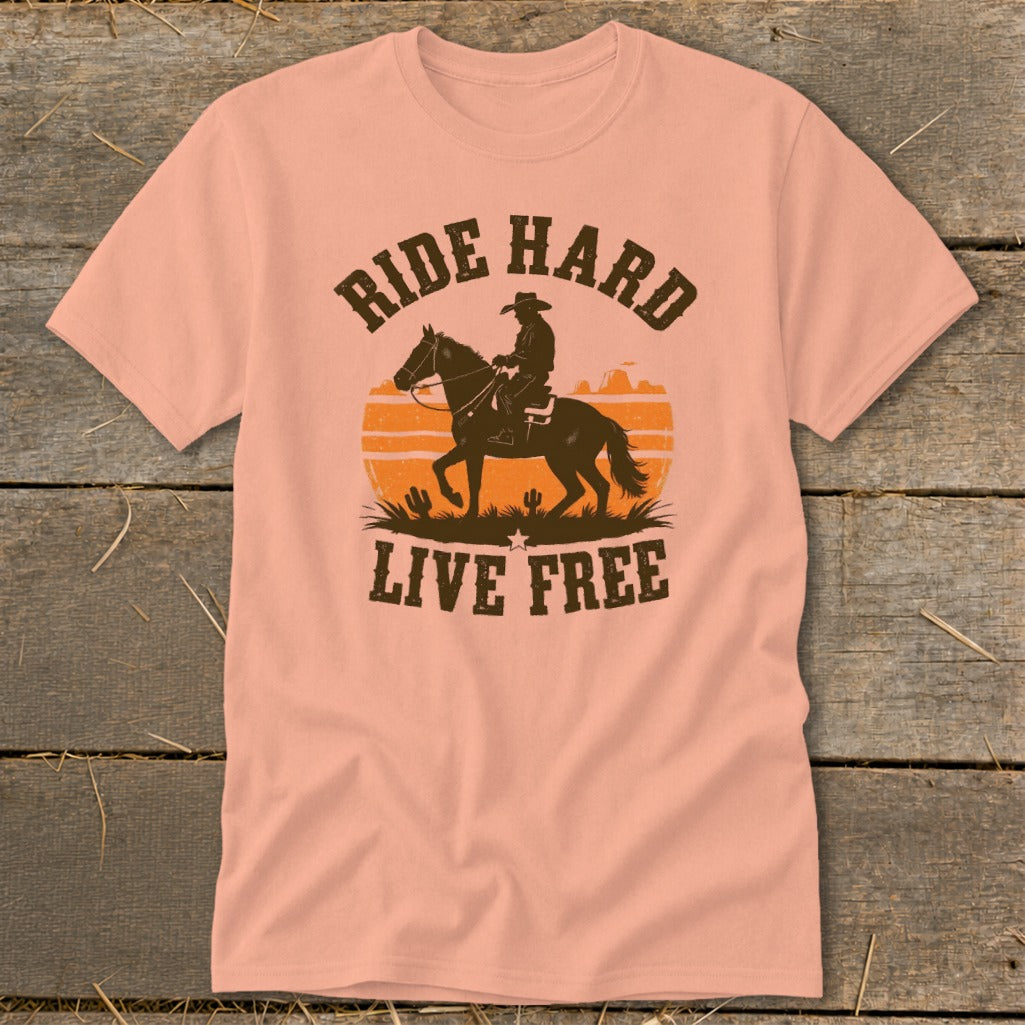 Peach t-shirt with "Ride Hard Live Free" text and cowboy on horseback graphic.