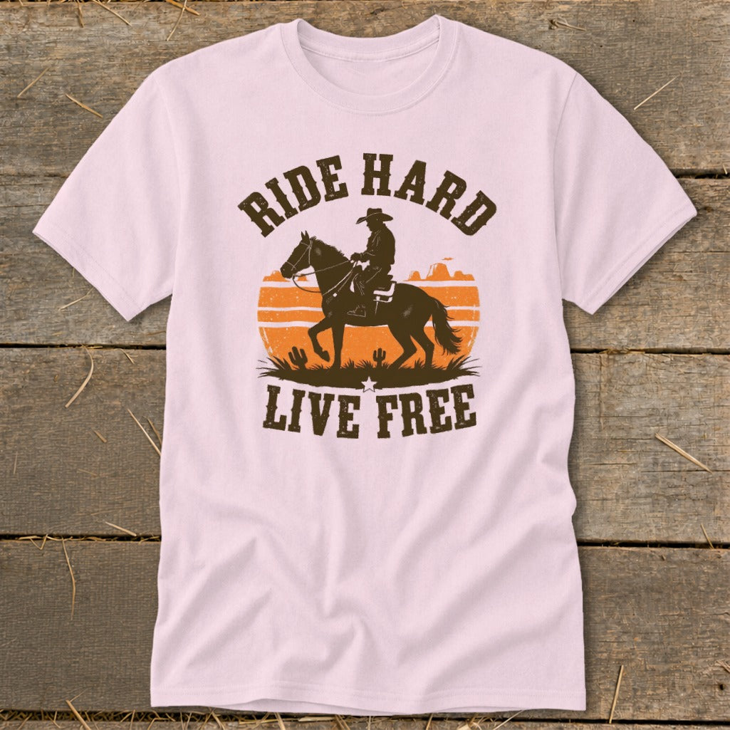 Light pink t-shirt with distressed cowboy riding a horse silhouette and "Ride Hard Live Free" text.