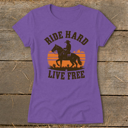 Purple t-shirt with a cowboy on horseback silhouette and text "RIDE HARD LIVE FREE".