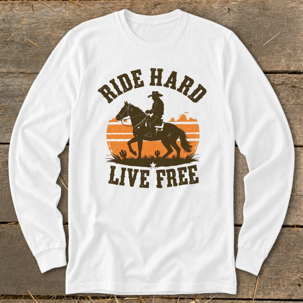 White long-sleeve shirt with cowboy on horse graphic and text "RIDE HARD LIVE FREE".