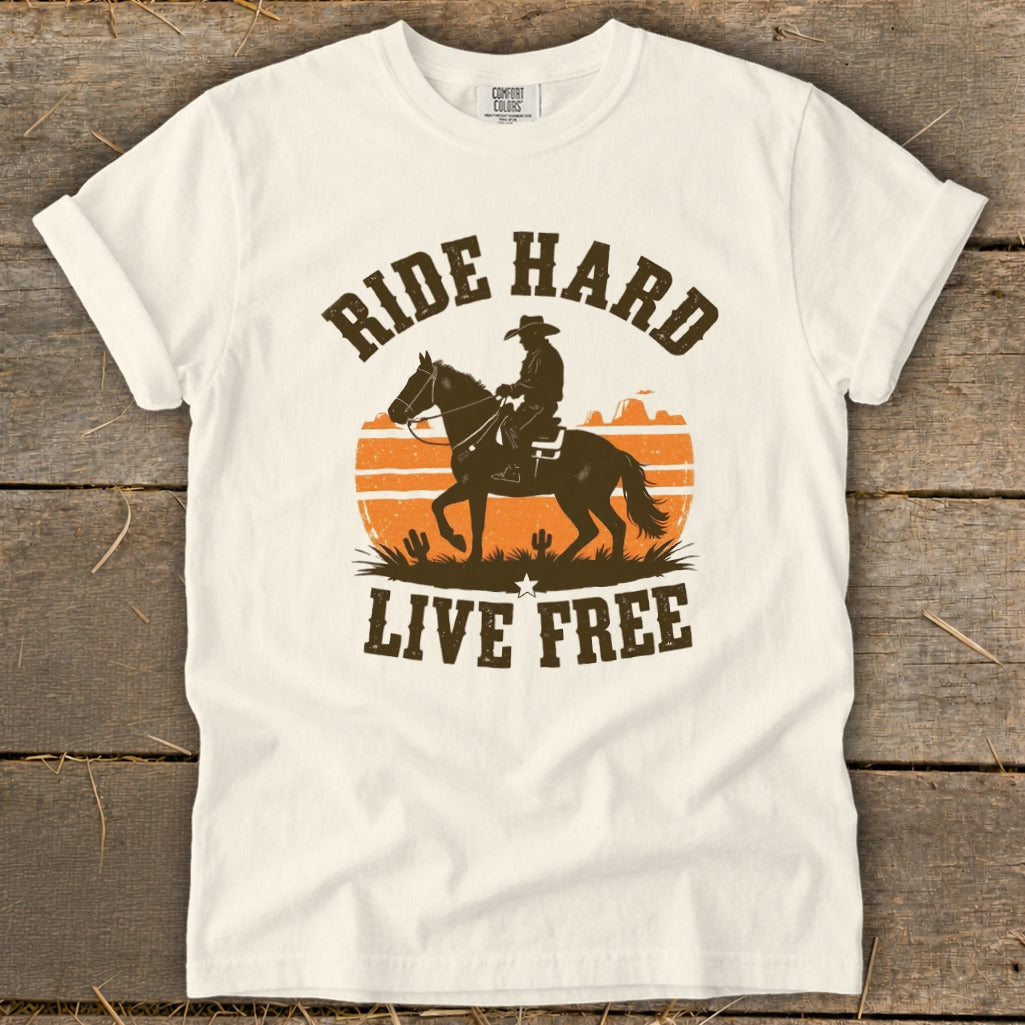 White t-shirt with distressed cowboy riding horse graphic and text "RIDE HARD LIVE FREE".