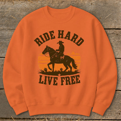 Orange sweatshirt with graphic of cowboy riding horse, text "RIDE HARD LIVE FREE".