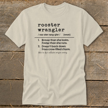 T-shirt with "rooster wrangler" definition and "villain origin story" text.